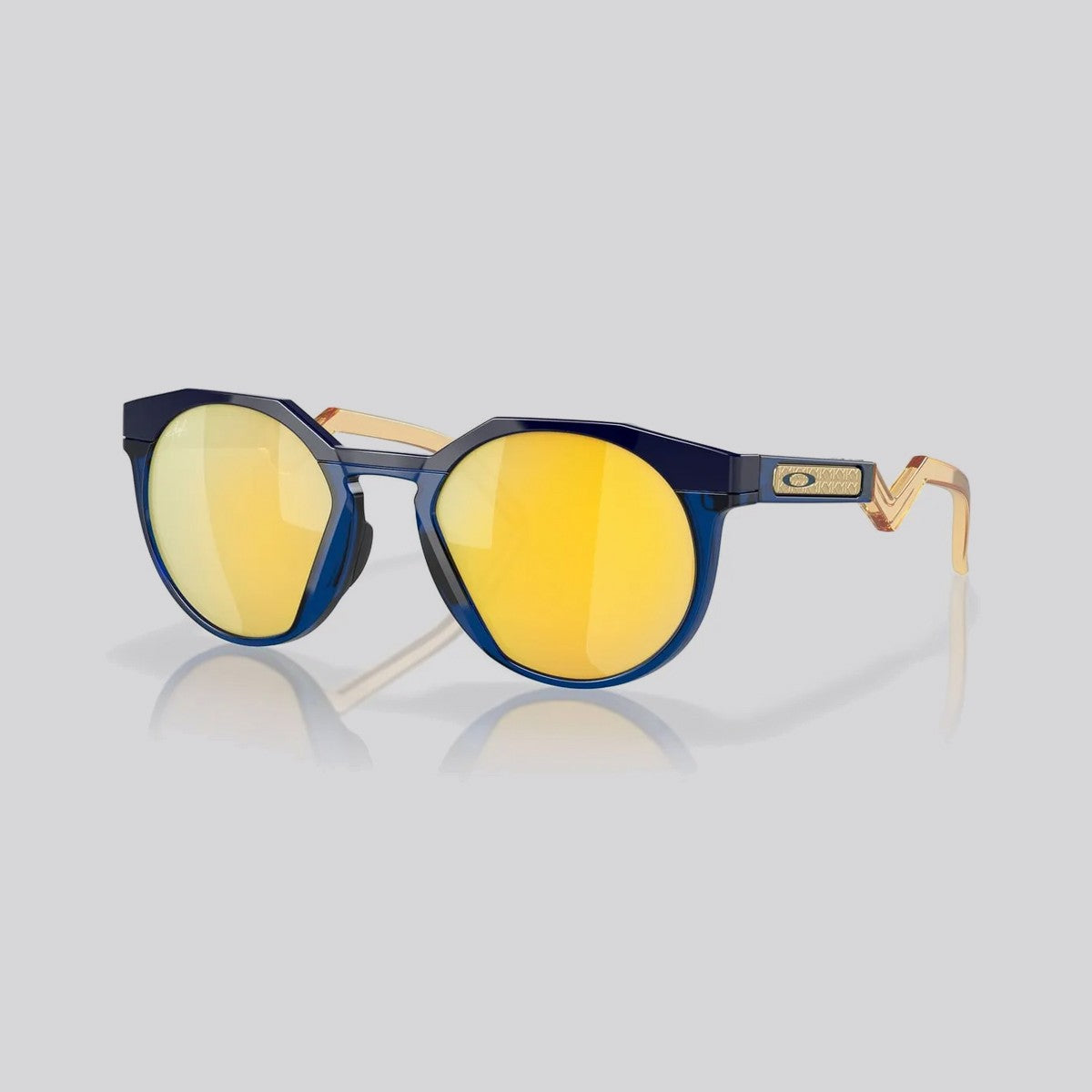 Lentes de Sol Oakley HSTN Trans Blue/Light Curry Prizm 24K