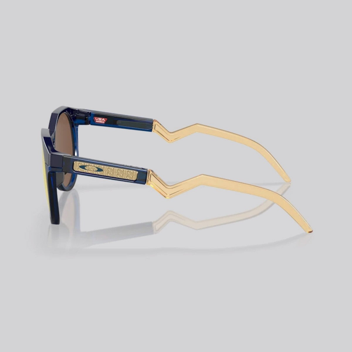 Lentes de Sol Oakley HSTN Trans Blue/Light Curry Prizm 24K Polarized