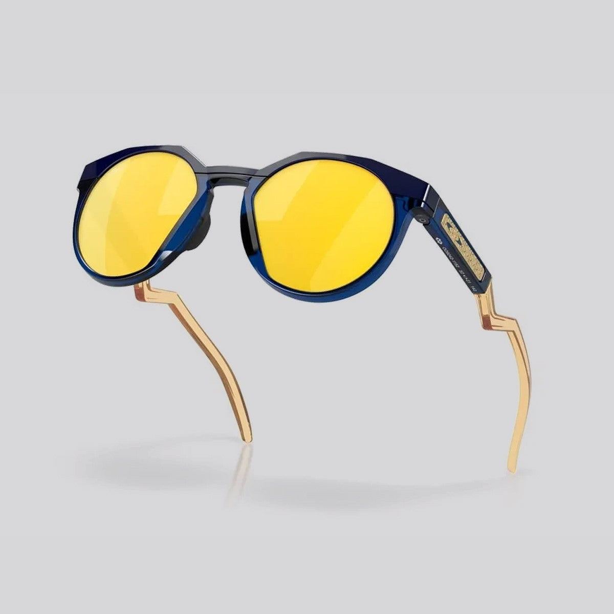 Lentes de Sol Oakley HSTN Trans Blue/Light Curry Prizm 24K